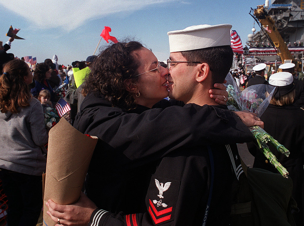 Nicole Rodriguez kisses her husband, Richard, a sailor based on the the aircraft carrier USS Enterprise, as he returns from deployment on Nov. 10, 2001.
Nicole Rodriguez kisses her husband, Richard, a sailor based on the the aircraft carrier USS Enterprise, as he returns from deployment on Nov. 10, 2001.