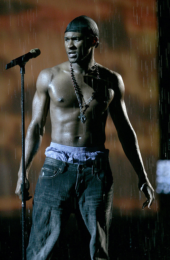 Usher rehearsed for the 2004 VMAs sans shirt and with fake rain falling in the background.
Usher rehearsed for the 2004 VMAs sans shirt and with fake rain falling in the background.