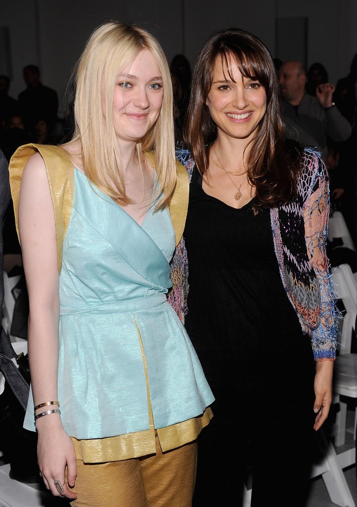 Dakota Fanning and Natalie Portman posed together as fans of Rodarte's collection in February 2012.
Dakota Fanning and Natalie Portman posed together as fans of Rodarte's collection in February 2012.