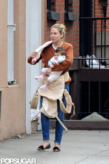 Sienna Miller held Marlowe in her arms. Sienna Miller held Marlowe in her arms.