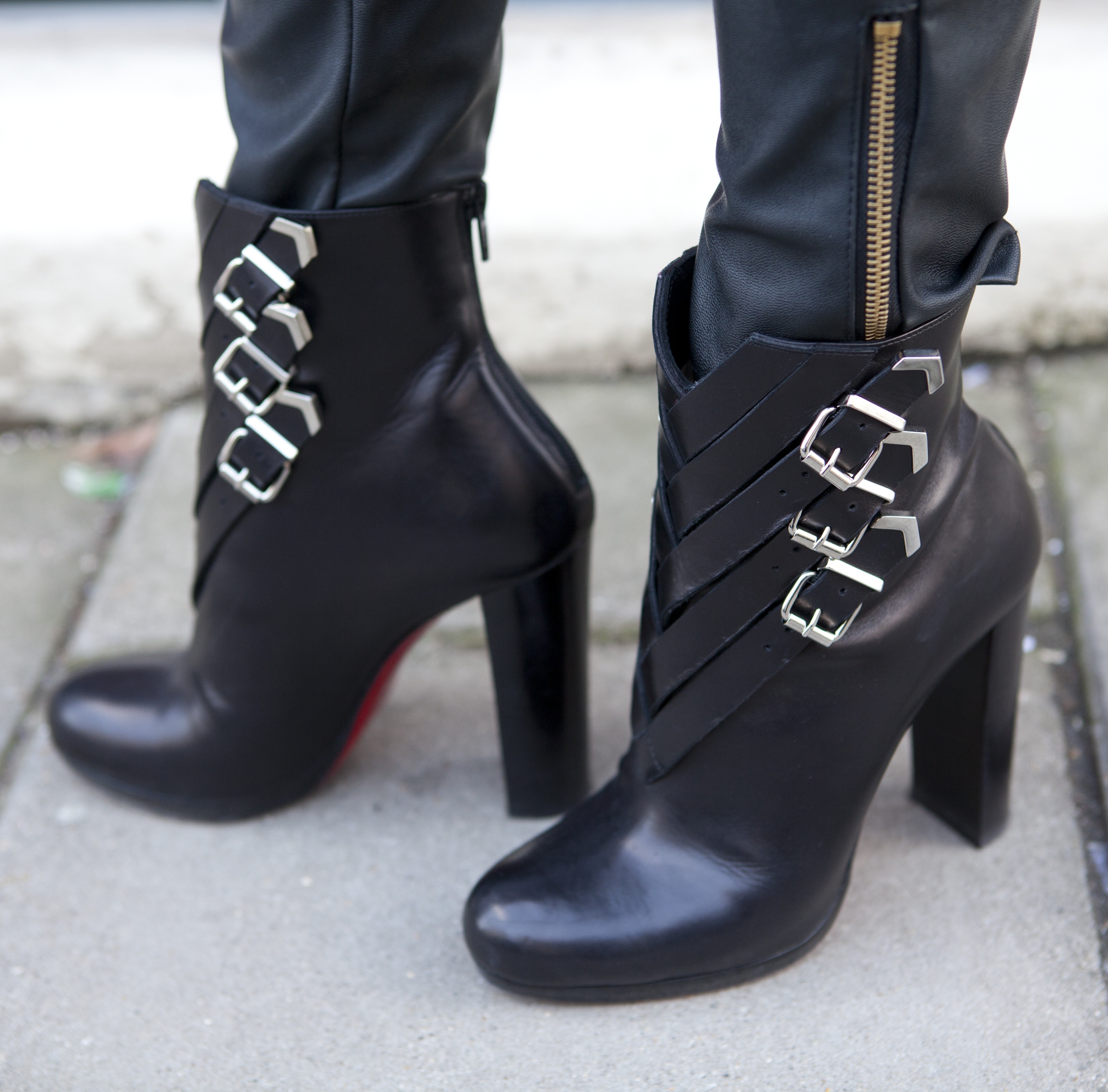 Buckle detailing on these Christian Louboutin ankle boots lent a ...  