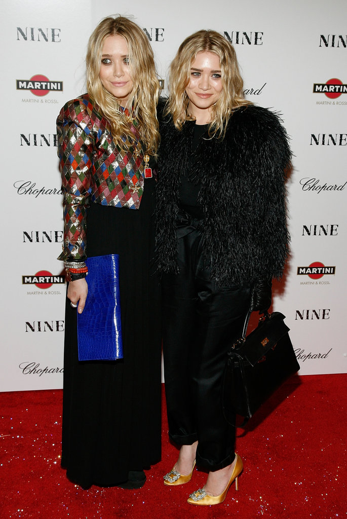 Twinning combo: Both girls wore eye-catching jackets and no-fuss beach waves for Nine's New York premiere in December 2009.
Mary-Kate brought major spunk in a shimmering harlequin jacket and cobalt leather clutch.
Ashley proved all-black is anything but boring in a cropped feathered jacket, silk trousers, and slick leather gloves.
Twinning combo: Both girls wore eye-catching jackets and no-fuss beach waves for Nine's New York premiere in December 2009.
Mary-Kate brought major spunk in a shimmering harlequin jacket and cobalt leather clutch.
Ashley proved all-black is anything but boring in a cropped feathered jacket, silk trousers, and slick leather gloves.