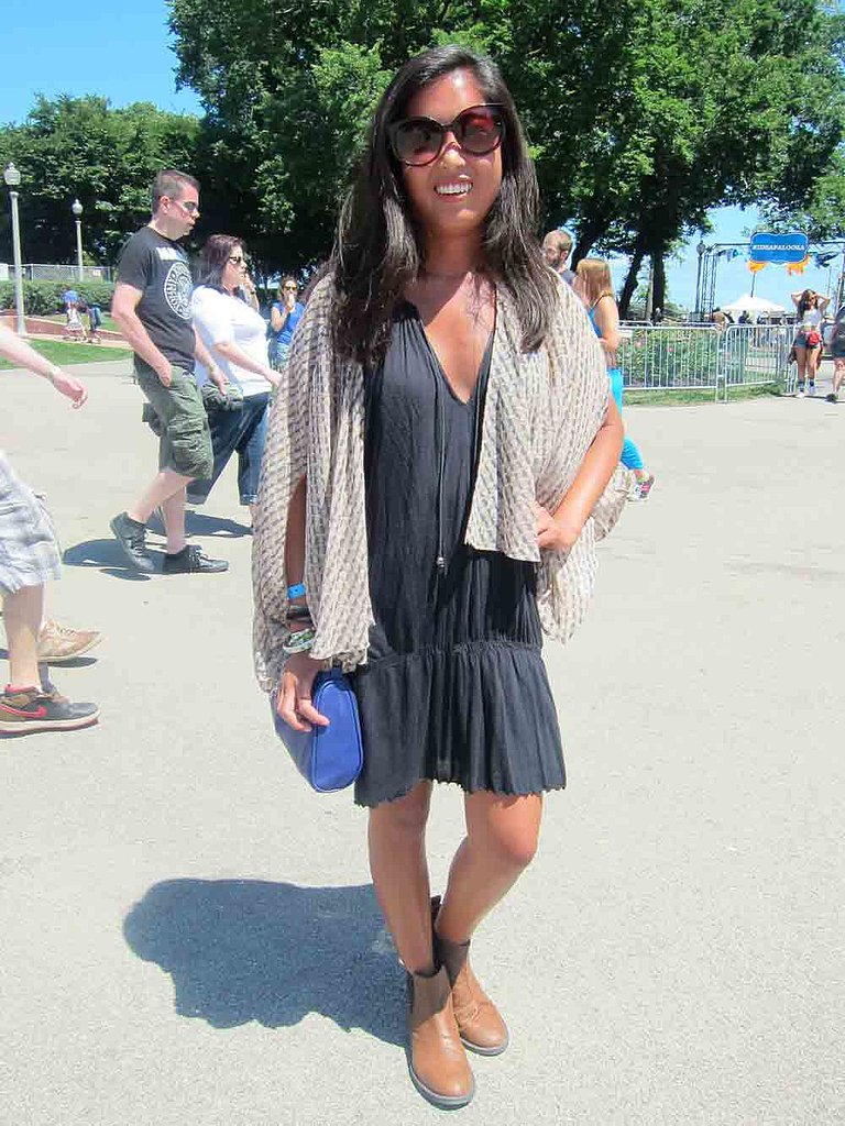 Chicago weather can leave you hot one minute and chilled the next. Stacey clearly came prepared for all conditions with an Akira kimono layered over her Free People dress. Her House of Harlow sunglasses and H&M bag didn't hurt, either.
Chicago weather can leave you hot one minute and chilled the next. Stacey clearly came prepared for all conditions with an Akira kimono layered over her Free People dress. Her House of Harlow sunglasses and H&M bag didn't hurt, either.