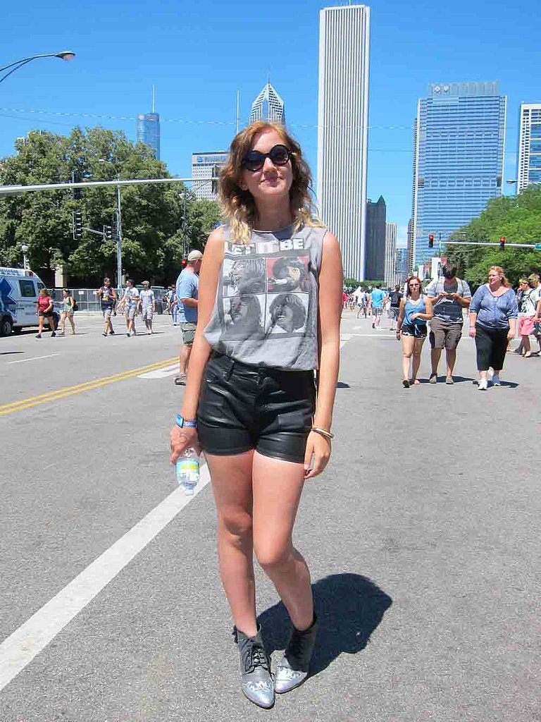 Josie let it be known (sorry, we couldn't help it!) that her favorite band wasn't on the lineup. Among all the music fans wearing official Lollapalooza merch, this vintage Beatles shirt stood out from the crowd. We're also impressed with how she managed to handle the heat in black leather shorts and Urban Outfitters silver-cap boots.
Josie let it be known (sorry, we couldn't help it!) that her favorite band wasn't on the lineup. Among all the music fans wearing official Lollapalooza merch, this vintage Beatles shirt stood out from the crowd. We're also impressed with how she managed to handle the heat in black leather shorts and Urban Outfitters silver-cap boots.