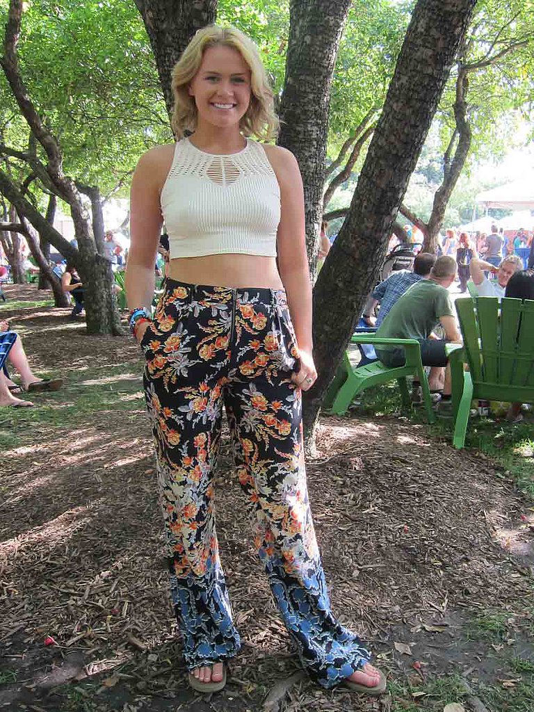 We'd wear Tori's floral-print BCBG Max Azria pants to the office! We love how she paired them with a cream Free People crop top for the festival but strongly encourage her to get as much use out of them as possible.
We'd wear Tori's floral-print BCBG Max Azria pants to the office! We love how she paired them with a cream Free People crop top for the festival but strongly encourage her to get as much use out of them as possible.