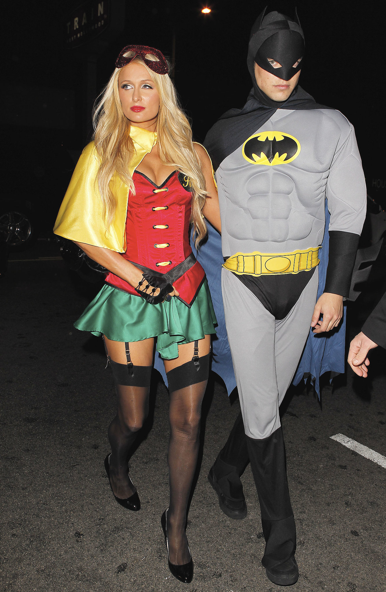 Paris Hilton and River Viiperi as Robin and Batman