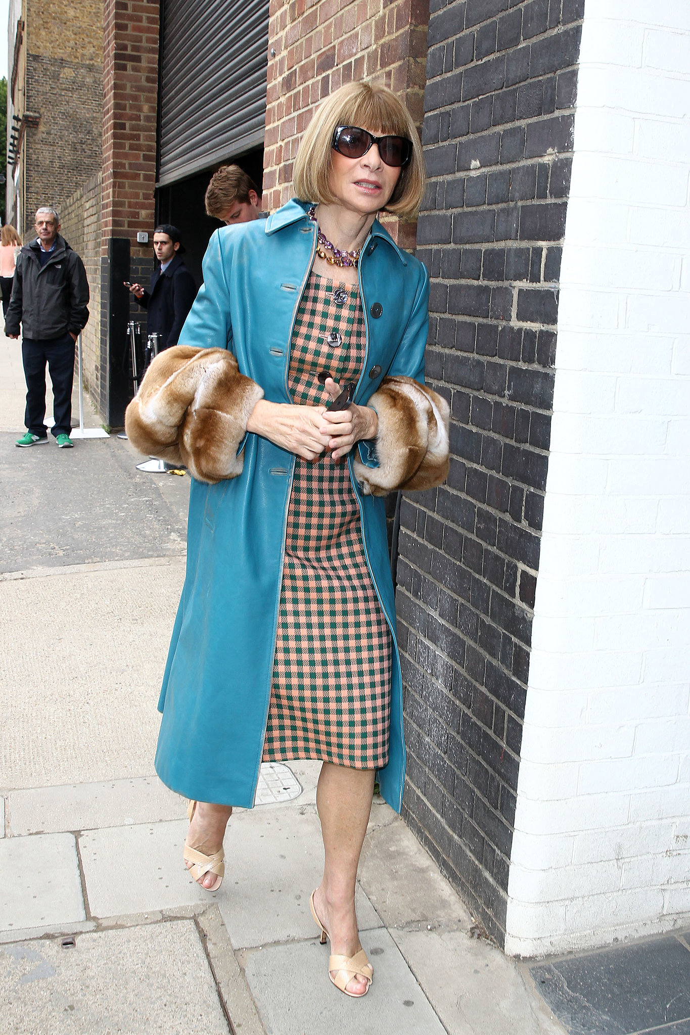 Anna Wintour made her way around London Fashion Week in a cozy style