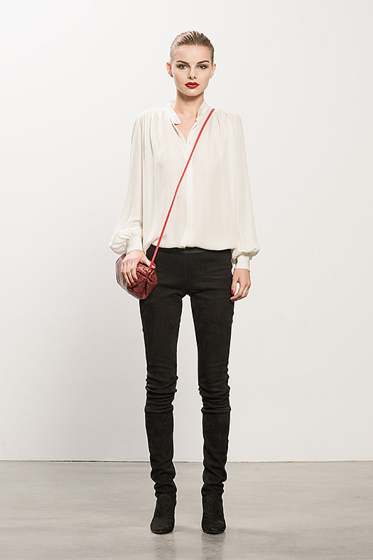 Georgette Cream Long Sleeve Blouse ($350), Sweet Revenge Black Suede Legging Boot ($2,395), Sunset Watersnake Red Cross Body Bag ($625)
Photo courtesy of Tamara Mellon
Georgette Cream Long Sleeve Blouse ($350), Sweet Revenge Black Suede Legging Boot ($2,395), Sunset Watersnake Red Cross Body Bag ($625)
Photo courtesy of Tamara Mellon