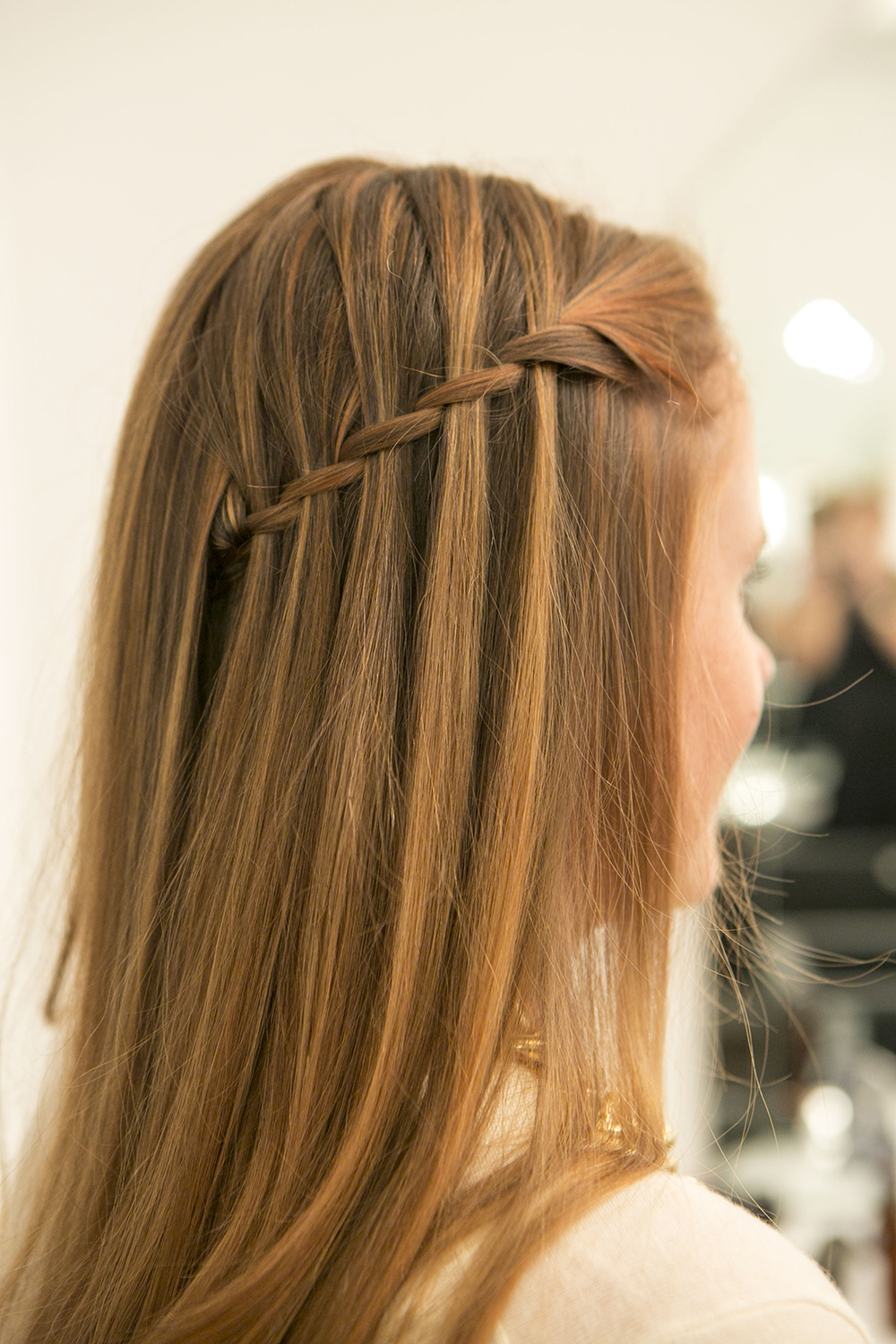 Drop your layers over pinned back braid admire your pinnable