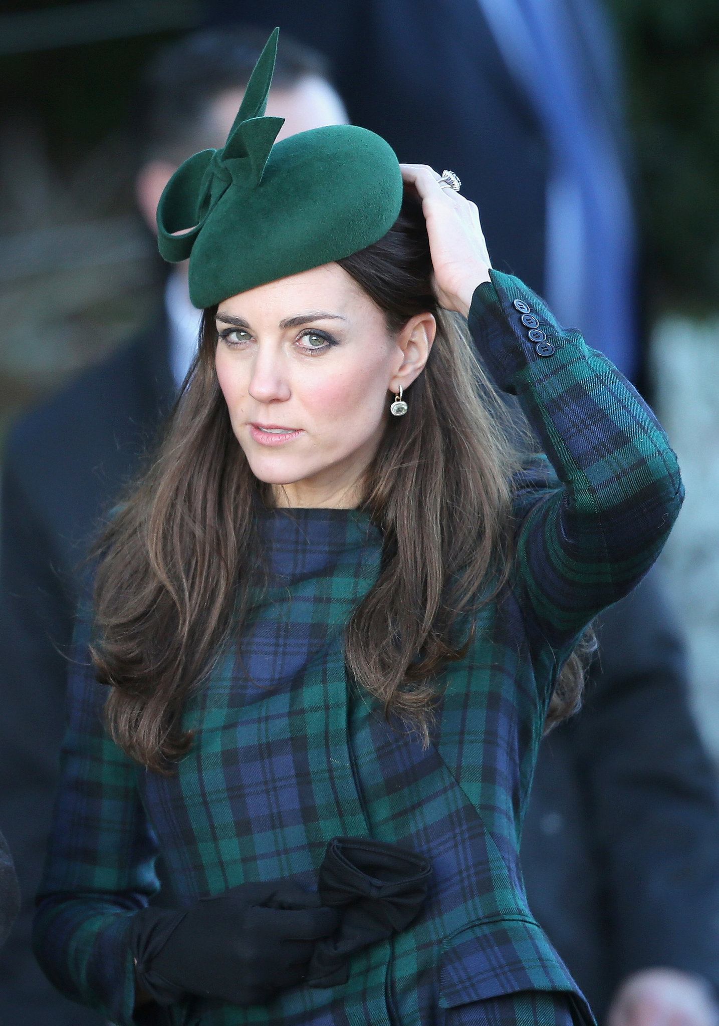 Kate Middleton wore a plaid coat and matching hat to the services