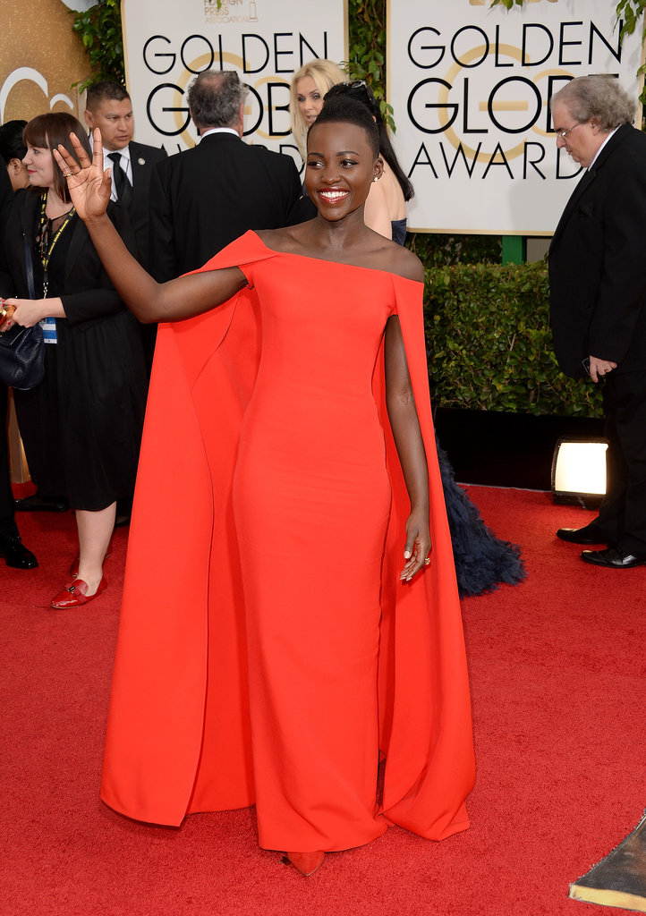 Lupita Nyong'o was gorgeous in red as she waved to the crowds outside.
Lupita Nyong'o was gorgeous in red as she waved to the crowds outside.