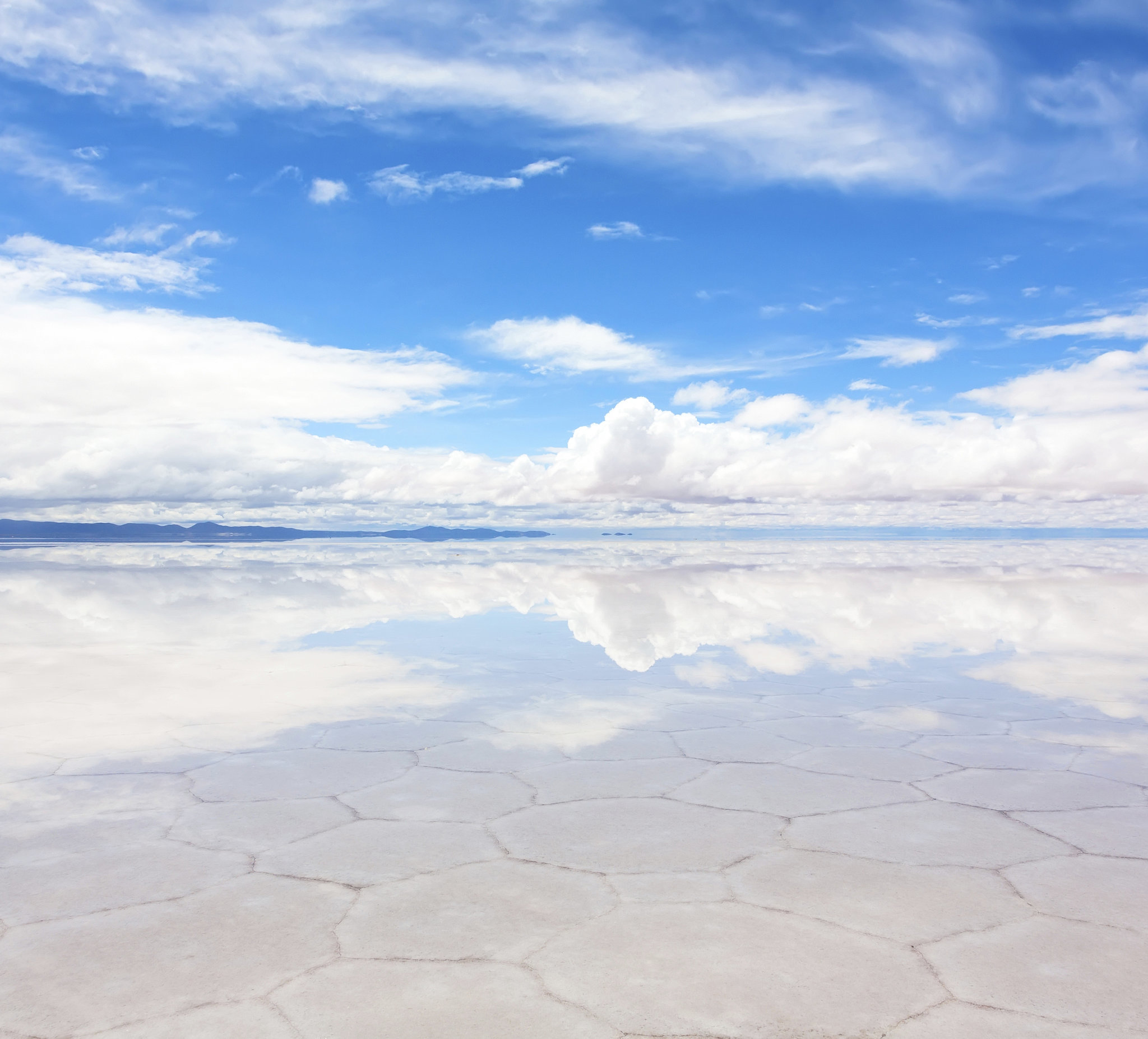 Literally Reflect at Salar de Uyuni, Bolivia 100+ Things to Do Before