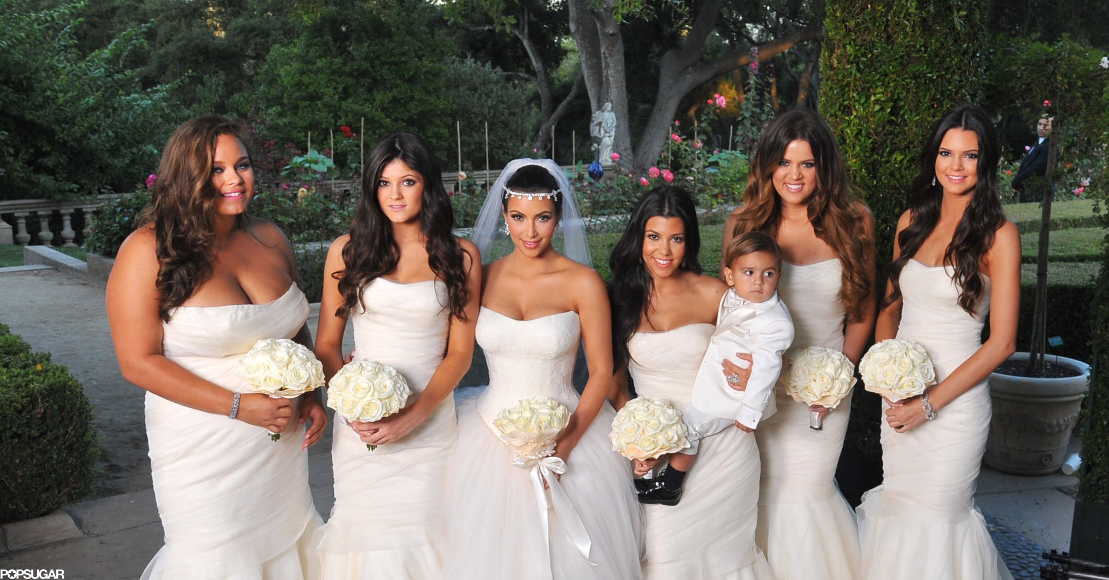 Kim posed with her bridesmaids sisters Khloé and Kourtney