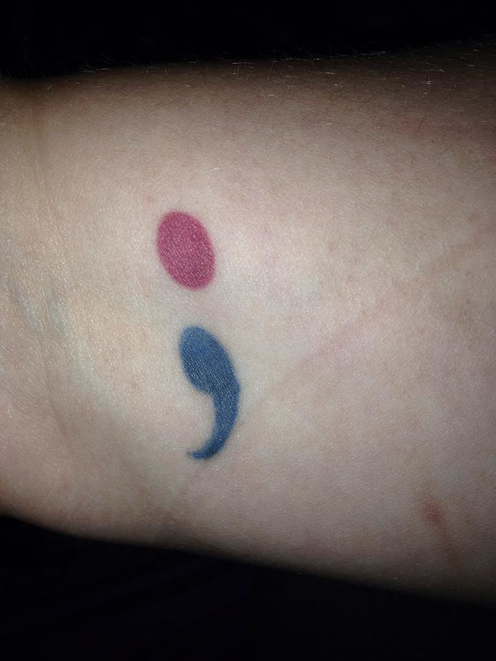 "I have three and I'm proud of mine. I had all three after kids. They each have meanings and I thought about them before I got them. My favorite is on my wrist. It's a semicolon. Because my husband passed away. The semicolon is where the author would have chosen to stop the sentence, but instead continued on. So my life has had loss, but I chose to continue on." — Anne Jones Bacheller
"I have three and I'm proud of mine. I had all three after kids. They each have meanings and I thought about them before I got them. My favorite is on my wrist. It's a semicolon. Because my husband passed away. The semicolon is where the author would have chosen to stop the sentence, but instead continued on. So my life has had loss, but I chose to continue on." — Anne Jones Bacheller