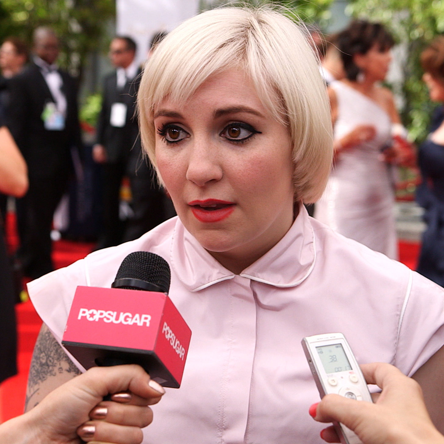 Watch Lena Dunham Perfectly Explain Her "Candy Land" Emmy Awards Dress