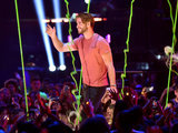 Liam Hemsworth Sports a Smile After He Avoids Being Slimed - Twice!