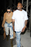 Kanye West Smiles While With