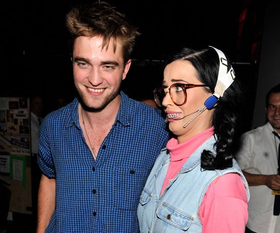 Katy Perry hosted the 2010 ceremony and geeked out taking a photo with Twilight's very sexy star, Robert Pattinson.
