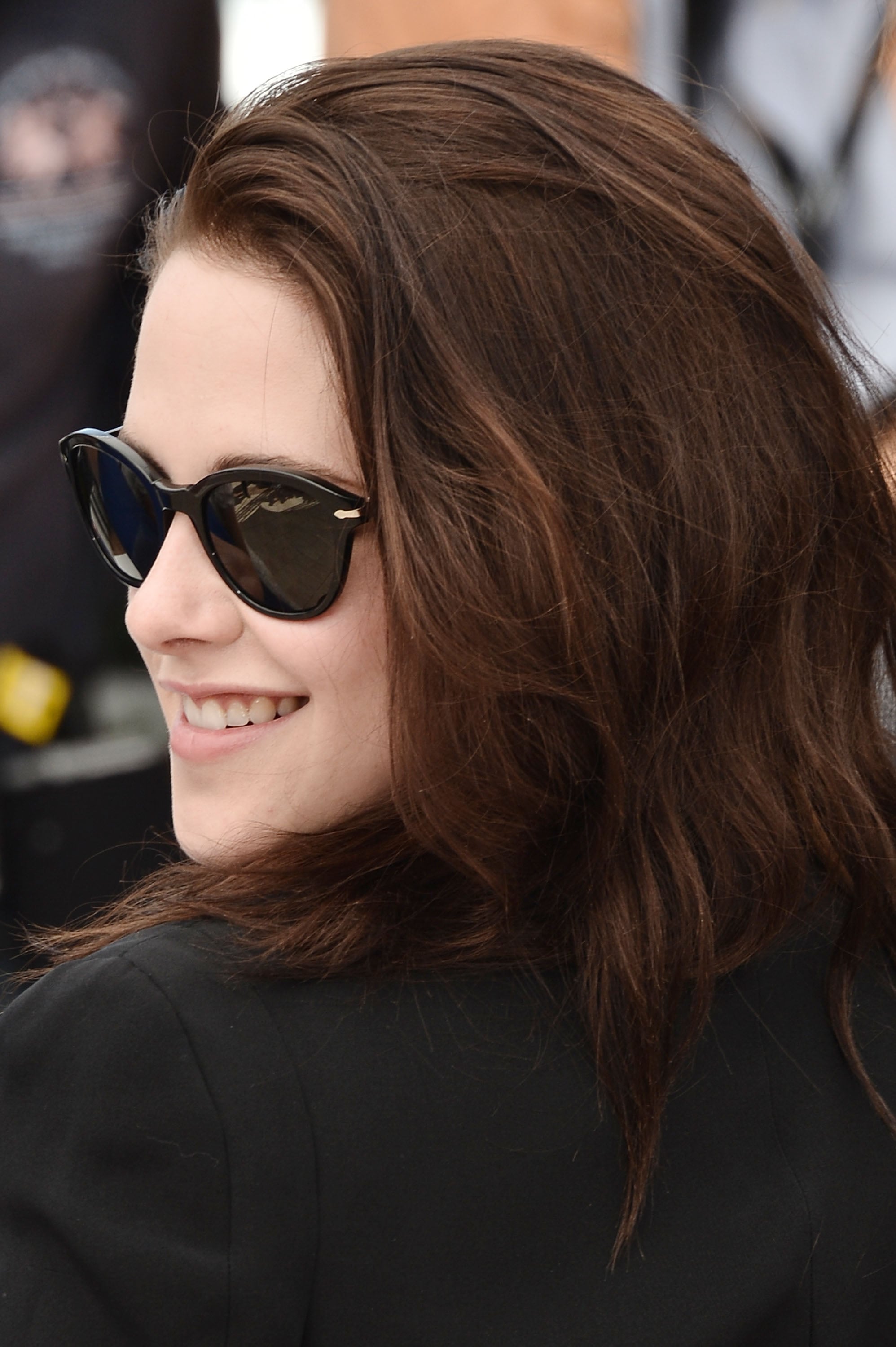 Kristen Stewart wore sunglasses to the On the Road photocall at the 