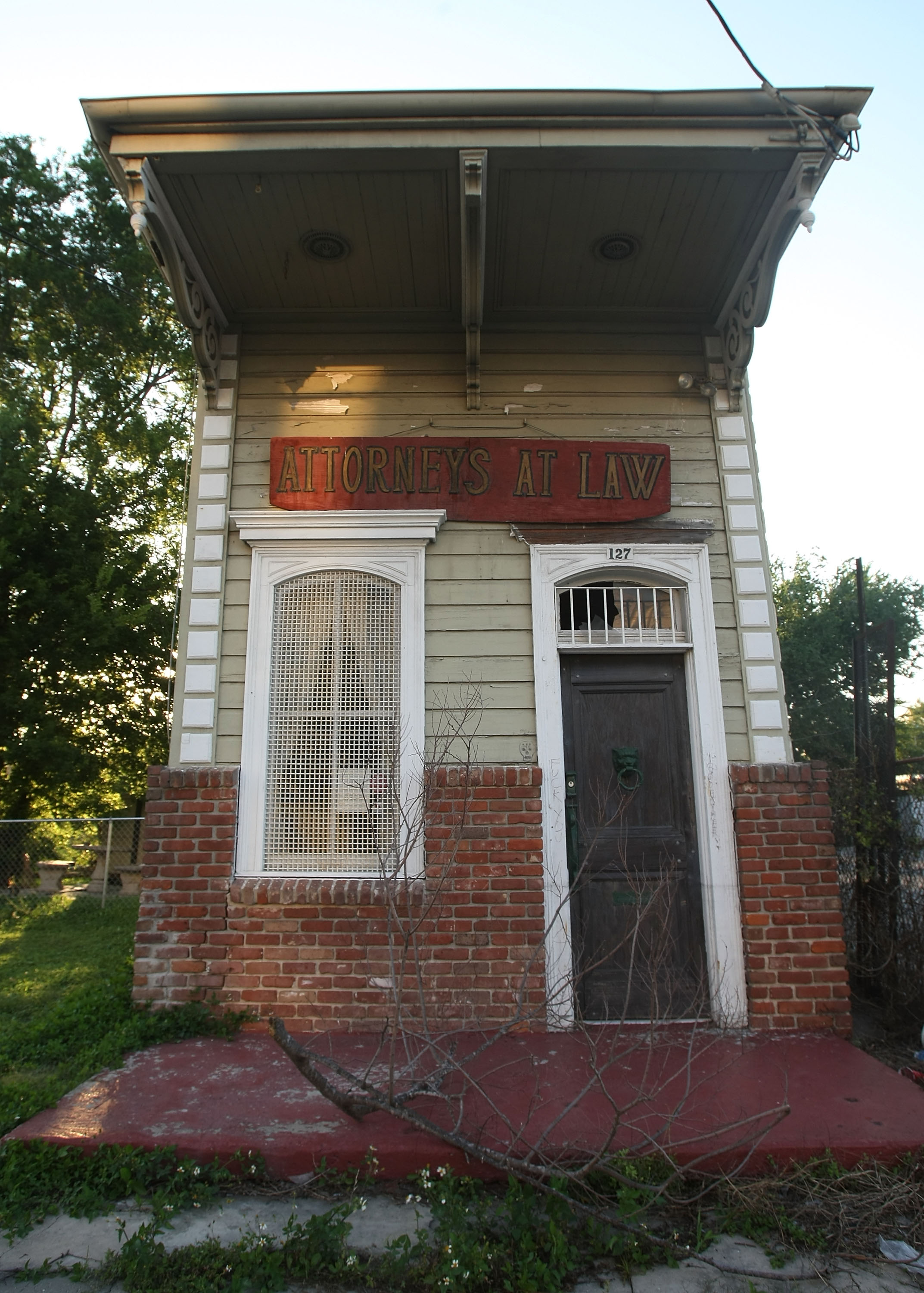 A shotgun house next to Charity Hospital in New Orleans, Louisiana. A shotgun house next to Charity Hospital in New Orleans, Louisiana.