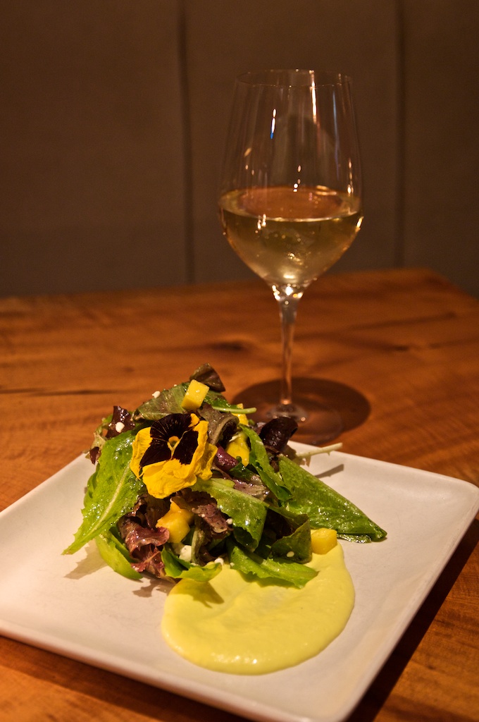 Avocado and mango salad with baby greens, barrel aged feta, white balsamic vinaigrette Avocado and mango salad with baby greens, barrel aged feta, white balsamic vinaigrette