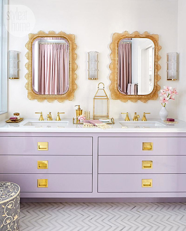 The purple and gold of this bathroom match her family's royal sigil ...