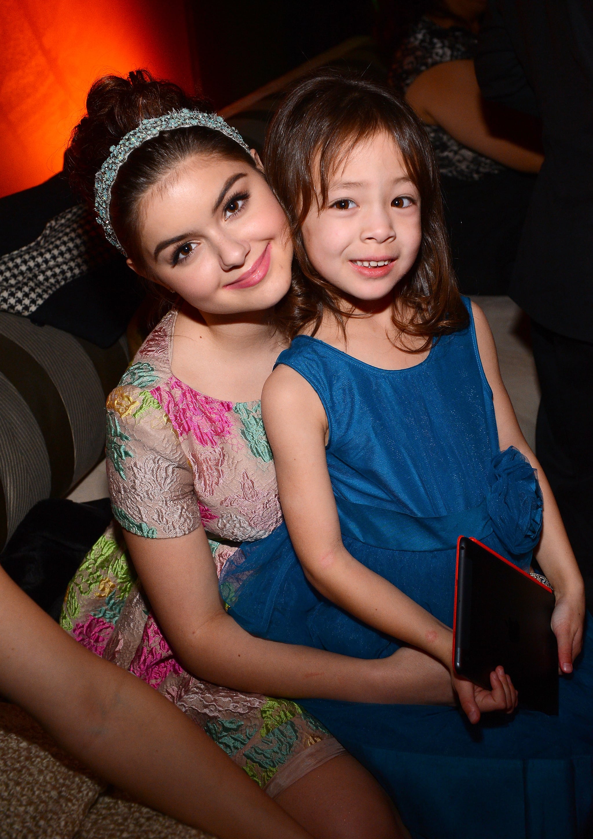 Modern Family costars Ariel Winter and Aubrey Anderson-Emmons smiled ...